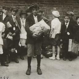 Boy with Package and Group ...