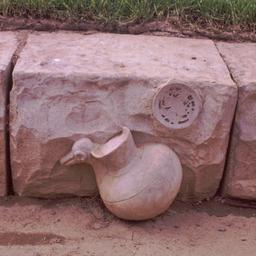 Ceramics imbedded in stone.