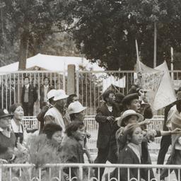 Tibetan children marching a...
