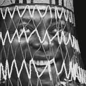 Oba Adesida in beaded crown...