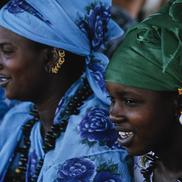 Two women, blue and green h...