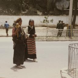 Two Tibetan women in foregr...