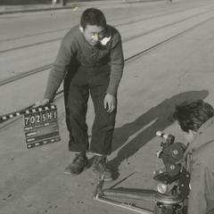A child actor is holding a ...