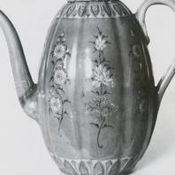 A celadon ewer in the shape...