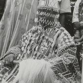 Oba Adesida in beaded crown...