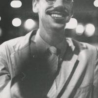 Ted Conant in a suit, smiling