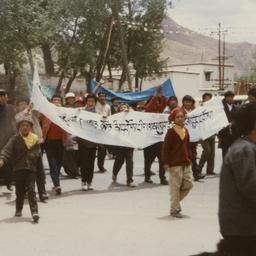 Tibetan men and young boys ...