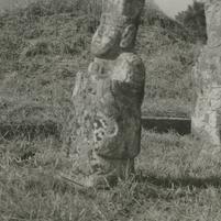Two male stone statues loca...
