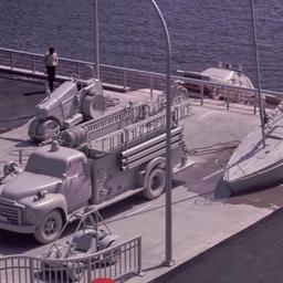 Gray boat, firetruck and st...