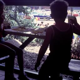 Interior view, children eat...