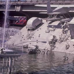 Gray vehicles emerging from...