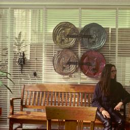 Interior view, woman seated...