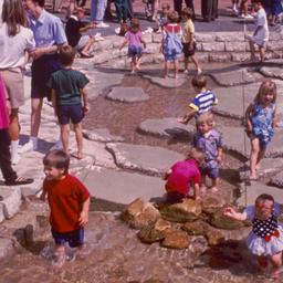 Crowds surrounding children...