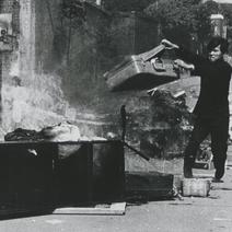 A man is holding a suitcase...