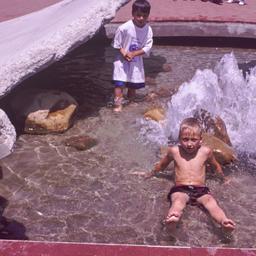 Children playing in broken ...