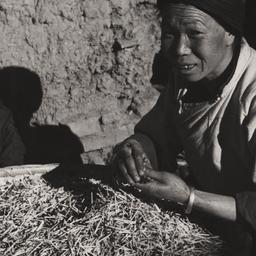 Woman With Woven Bowl