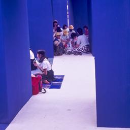 Children sitting in doorway...