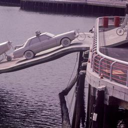 Gray plane and police car o...