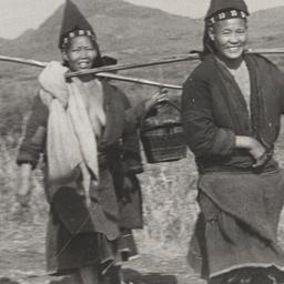 Two Tribal Men Walking