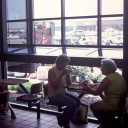 Interior view, patrons eati...