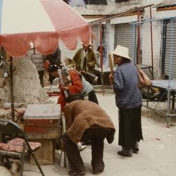 Tibetans preparing to burn ...