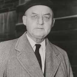 Reinhold Niebuhr wearing bl...