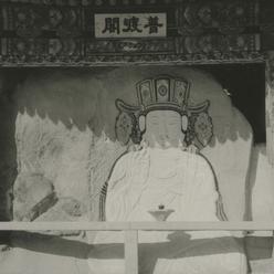A rock carved seated Bodhis...