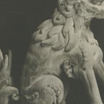 A stone sculpture of a lion