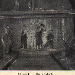 At Work in the Air-lock the...