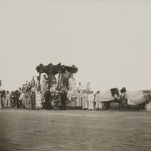 People Posing with Carousel