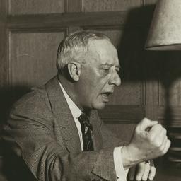 Al Smith speaking into an N...