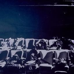 Theater seats with empty su...