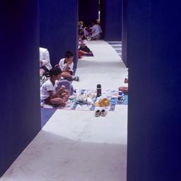 Seated children eating betw...