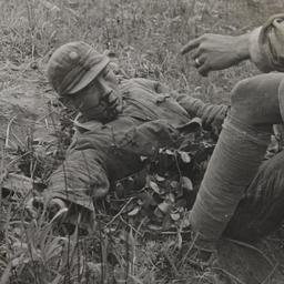 Wounded Man With Figure In ...