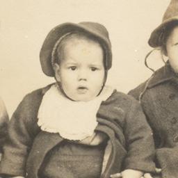 [Three Small Children in Ha...