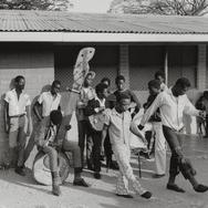 Teenagers playing instrumen...