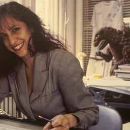 Woman at drafting table.