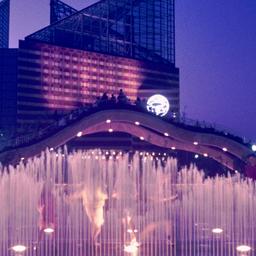 Fountain at night with brid...