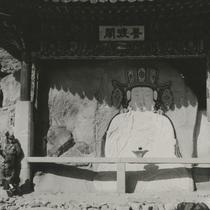 A rock carved seated Bodhis...