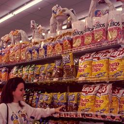 Grocery shoppers with displ...