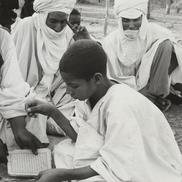 Tuareg nomad boy learns to ...