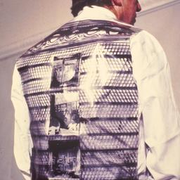 Man wearing plastic vest wi...