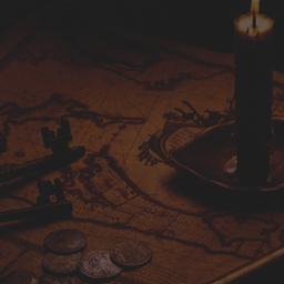 Candle, keys, coins and tel...