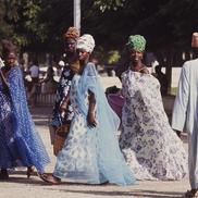 Women in colorful dress, Pl...