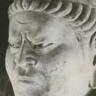 A stone statue of a warrior...
