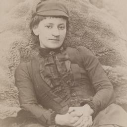 Mary Aitken Sitting Outdoors