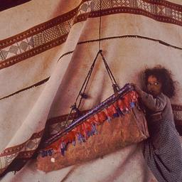 Child with carpet.