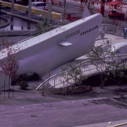 Gray submarine rising onto ...