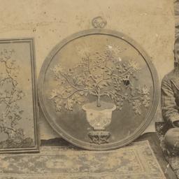 Gegen Tharchin seated with ...