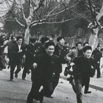 Protestors running away in ...